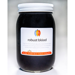 Syrup in glass jar with white lid. Ingredients include Rosehips, Yellowdock Root, Dandelion Leaf, Moringa Leaf, Nettle Leaf, Molasses, Raw Local Honey, Brandy, Citric Acid.